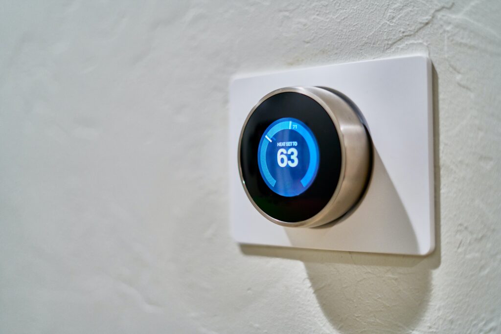 Energy-saving smart thermostat in an Arizona home, offered by AZ Home Services Group