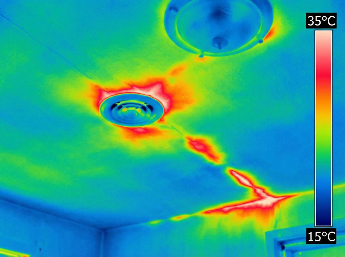 Infrared thermal image showing hot spots from duct leaks in Chandler Arizona home ceiling